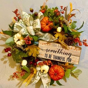 23” fall grapevine wreath. Pumpkins, gourds, foliage, wired ribbon, wood sign